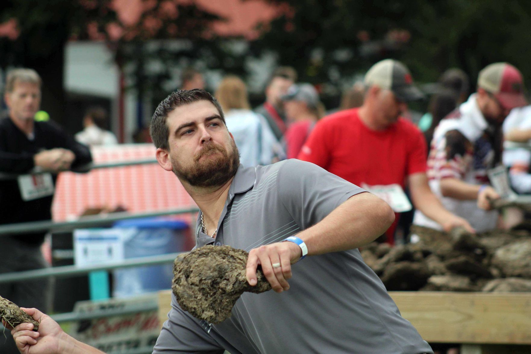 Chad throws cow chip